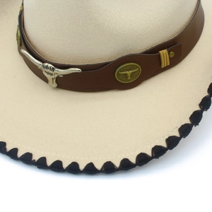 Beige wool western cowboy hat with brown leather band, longhorn skull and stitched brim