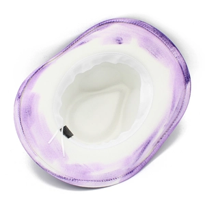 Detail of white cowboy hat interior with purple gradient rim, sweatband and drawstring