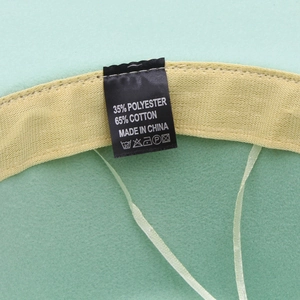 Detail of wool fedora inner sweatband with label showing 65% cotton and 35% polyester
