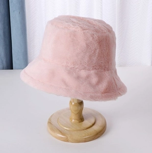 Classic light pink plush bucket hat for women with soft faux fur and windproof warm texture