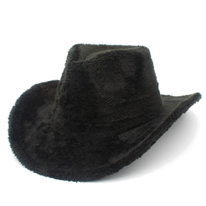 Detailed view of black fuzzy cowboy hat with wide brim in soft faux fur material