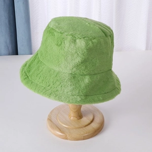 Classic grass green plush bucket hat made of soft faux fur for autumn and winter warmth