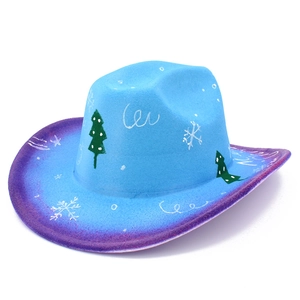 Detailed view of sky blue cowboy hat with festive Christmas tree and snowflake patterns