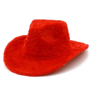 Detail shot of bright red fuzzy plush western cowboy hat with a soft shaggy texture
