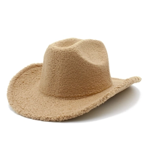 Detailed view of camel-colored cowboy hat made of warm fleece and plush teddy fabric