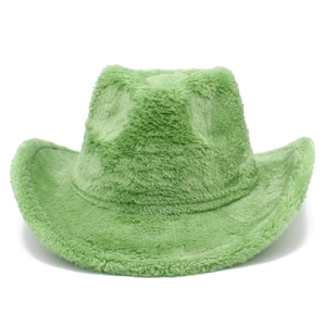 Detail of emerald green fuzzy cowboy hat with soft faux fur texture and wide brim
