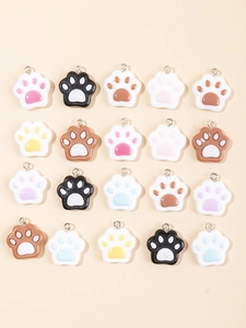 Detailed grid of colorful resin cat paw charms with metal rings for DIY jewelry making
