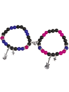 Detailed view of beaded couple bracelets with magnetic heart and guitar star pendants