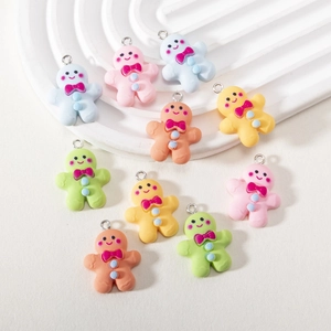 Colorful resin gingerbread man pendants with metal loops for DIY jewelry making and crafts