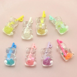 Close-up of assorted colorful resin mini bear bubble tea charms for DIY jewelry making