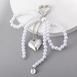 Dolce Pendaglio per Borsa con Fiocco in Künstliche Perle d'Imitazione e Ciondolo a Cuore in Lega Portachiavi a Fiocco Fatto a Mano per Donna Ragazza Accessori Moda