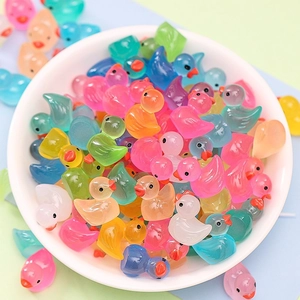 Mixed color mini luminous resin ducks in a bowl for DIY crafts and micro landscapes