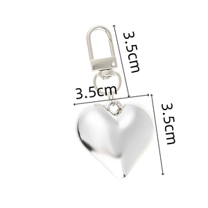 Sleek silver heart pendant keychain with spring snap hook for bags, measuring 3.5cm