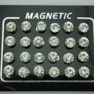 Set of 24 magnetic 6mm rhinestone earrings for non-pierced ears on a black display card