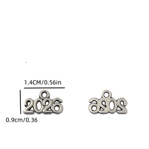 Detail of 2026 year number charms in antique silver alloy for DIY jewelry making