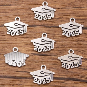 Detail of 2025 graduation cap charms in antique silver alloy for DIY jewelry