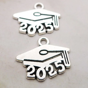 Macro detail of antique silver 2025 graduation cap pendant charm for DIY jewelry making