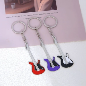 Mini electric guitar enamel metal keychains in red, purple, and black colors