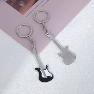 Miniature electric guitar keychain made of black and white zinc alloy with a silver ring