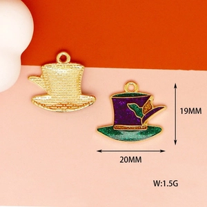 Detailed view of 19mm purple and green glitter hat charm pendant with alloy gold finish