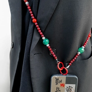 Chaîne de téléphone à bandoulière en perles rouges et coque d'art calligraphique