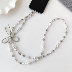 Crossbody pearl phone strap with silver bow accent and purple crystal beads decoration