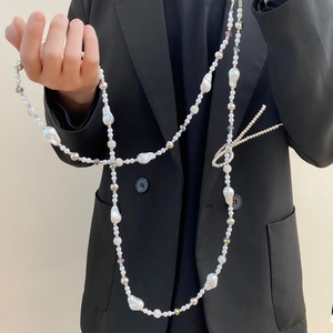 Elegant long pearl crossbody phone chain with baroque pearls and rhinestone beads