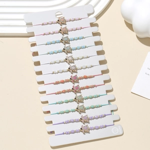 Set of 12 colorful braided turtle bracelets with crystal rhinestone charms for women