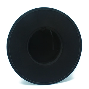 Detail view of the wide brim hat interior showing 65% polyester 35% cotton fabric label