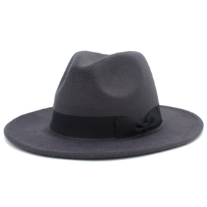 Detailed close-up of dark grey wool fedora hat with black wide ribbon and bow knot decor