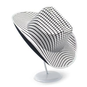 Close-up of a silver disco cowboy hat featuring reflective metallic square sequins