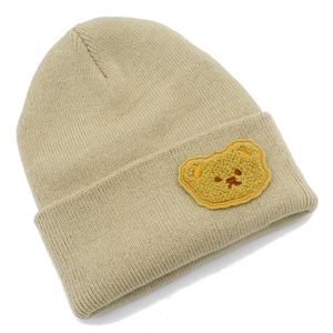 Berretto in maglia unisex con toppa a forma di orsetto giallo in colore beige crema