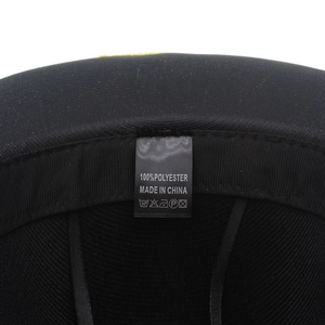 Detail view of the black 100% polyester interior lining and care label of the cowboy hat
