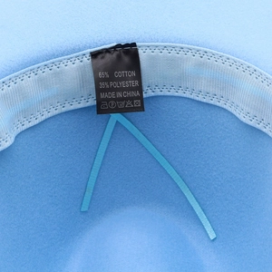 Detail view of the fedora hat's inner cotton blend lining with adjustable drawstring straps