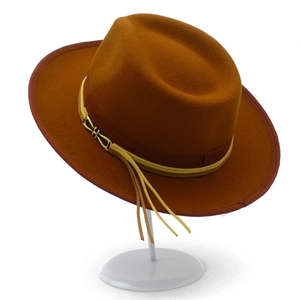 Classic caramel wool fedora hat with elegant brim piping and decorative tassel buckle
