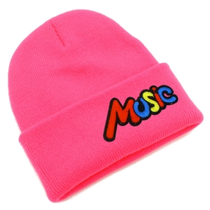 Detailed view of pink knitted beanie with colorful MUSIC embroidery and ribbed texture