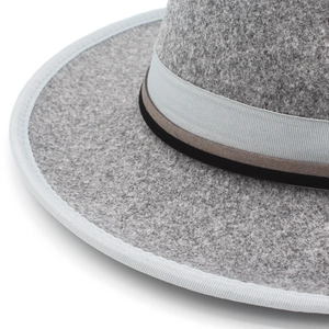Detailed macro view of the grey wool felt fedora with triple-layered decorative band