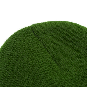 Detailed close-up showing the crown stitching of this green knitted beanie hat