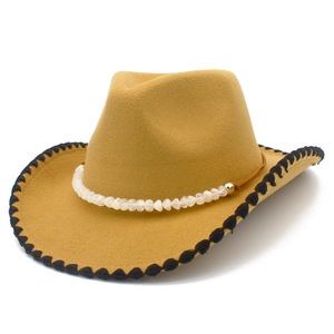 Classic mustard yellow felt cowboy hat with decorative bead chain and stitched brim edges