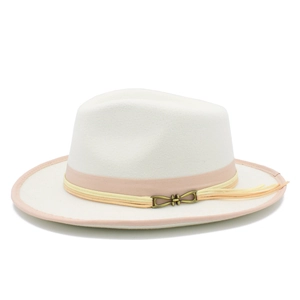 Detail view of a white wool fedora hat featuring a pink band with a vintage metal buckle