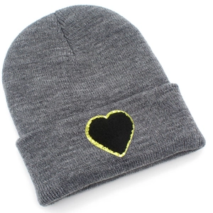 Detail of grey knitted beanie with a black glitter heart patch on the folded cuff