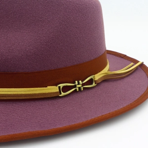 Detail of wool fedora showing burgundy felt, decorative yellow rope, and vintage buckle