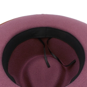 Detail of wool fedora hat interior with adjustable sweatband and sizing ribbons