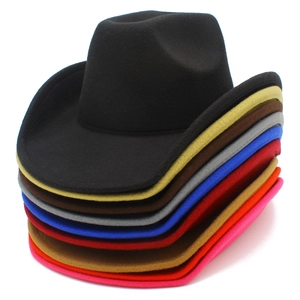 Detailed stack of multi-colored felt cowboy hats showing wool fabric and curved brims