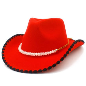 Classic red felt western cowboy hat with black stitched brim and pink beaded band decor
