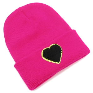 Ribbed rose red knit beanie featuring a black heart patch with gold glitter borders