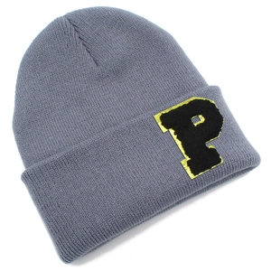 Close-up of the fine knit texture and embroidered black letter P on a grey beanie hat