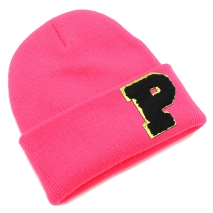 Detail of hot pink knit beanie featuring a P-letter patch with gold embroidered edges