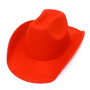 Macro detail of red wool felt western cowboy hat with curved brim and indented crown