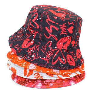 Detailed view of graffiti bucket hats with kiss prints and heart motifs in four colors
